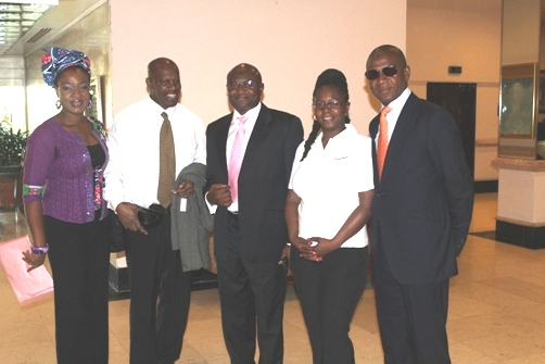 Denis St Bernard, Wale Sonaike, Carol Vaughan-Roberts and Bola Akindele in the lobby of Jamaica Pegasus