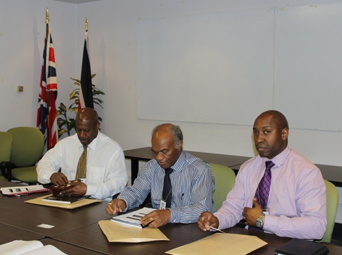 (L-) Priority Group Int'l's director Denis St Bernard and Chairman Clyde Baker, Zeraxis Managing Director Del Atah