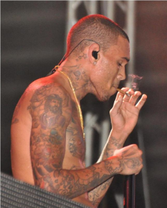ROLLED Chris Brown has angered by smoking weed on stage in Ghana