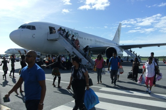 Bajan and other Caribbean nationals arrive at Guyana's Cheddy Jagan International Airport. Photo courtesy www.gina.gov.gy