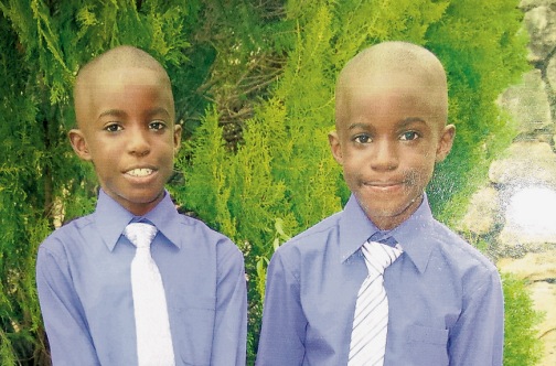Brandon and Brayden Jones, who are missing and feared dead after being washed away by flood waters in St James yesterday.