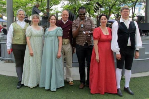 Damian poses with some performers at the Toronto Harbourfront Centre's "Kick Up Your Heels" Dance Festival