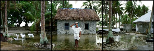 The Maritime Institute of Tuvalu on the island of Amakuku is regularly flooded during high tide. Senior John Iakopo stands in front of one of a 1905 Colonial building, one of the countries oldest. Photo courtesy www.robinhammond.co.uk