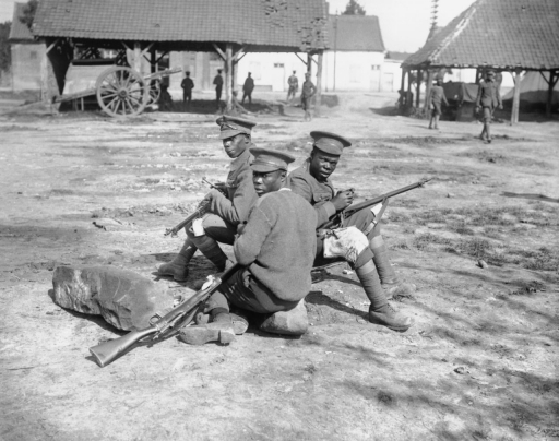 Troops of the British West Indies Regiment cleaning their rifles on the Albert - Amiens road, September 1916 (© IWM Q 1201). Photo courtesy http://www.centenarynews.com