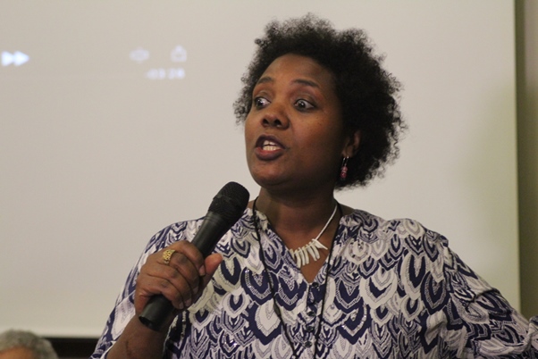 The effervescent Kesheniwa Aghaji outlines the back story of the Memorial Aid song. Photo courtesy CaribDirect