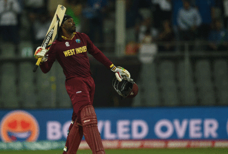 Chris Gayle acknowledges the crowd after reaching a century. (Picture courtesy ESPNcricinfo) http://www.nationnews.com/