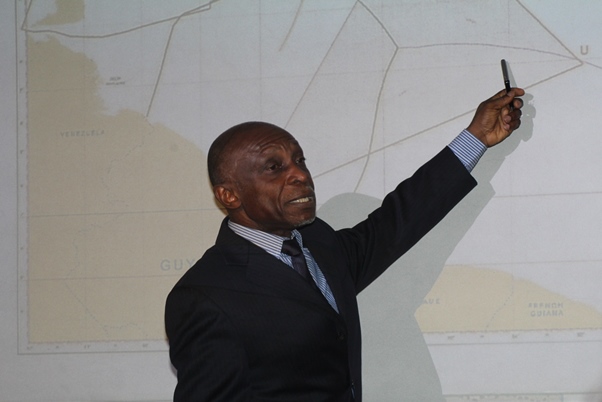 Hon Carl Greenidge making point about the boundary between Guyana and Venezuela. Photo courtesy CaribDirect