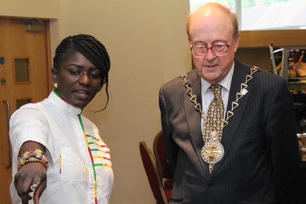 GUBA Chief Executive Officer & Founder of GUBA Awards & GUBA Foundation, Dentaa Amoateng making a point to Mayor Norman Adams. Photo courtesy David F. Roberts