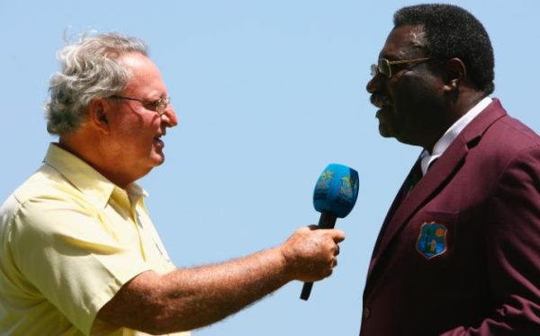 Tony Cozier (left) interviewing cricket legend Sir Clive Lloyd. Photo courtesy http://www.telegraph.co.uk