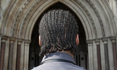 G, who was refused entry to St Gregory's Catholic Science College in Kenton, Harrow, north London, in 2009 because he wears his hair in cornrows, outside the high court. Photograph: Lewis Whyld/PA