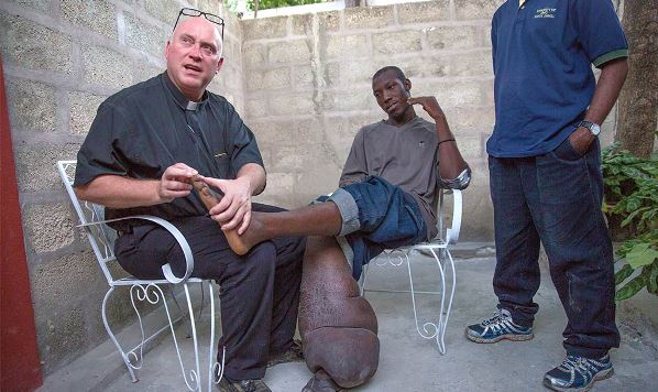 To help Haiti eliminate lymphatic filariasis, a disease that affects nearly half of its population, Cargill teams up with the Reverend Thomas Streit C.S.C. and the University of Notre Dame’s Haiti Program. Photo courtesy http://www.forbes.com